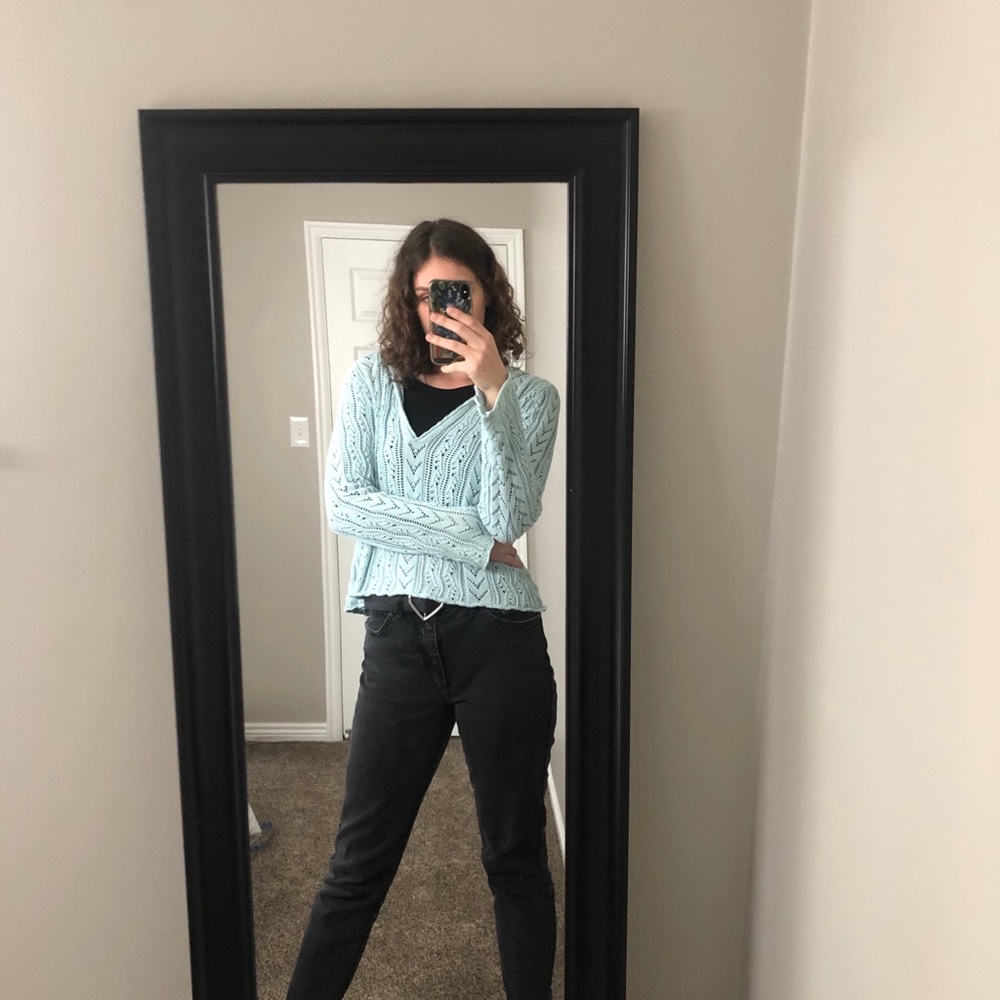 Knitted deep neckline sweater